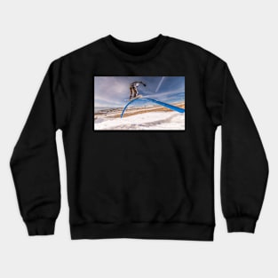 Snowboarder sliding on a rail Crewneck Sweatshirt